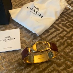 Coach gold and burgundy bracelet